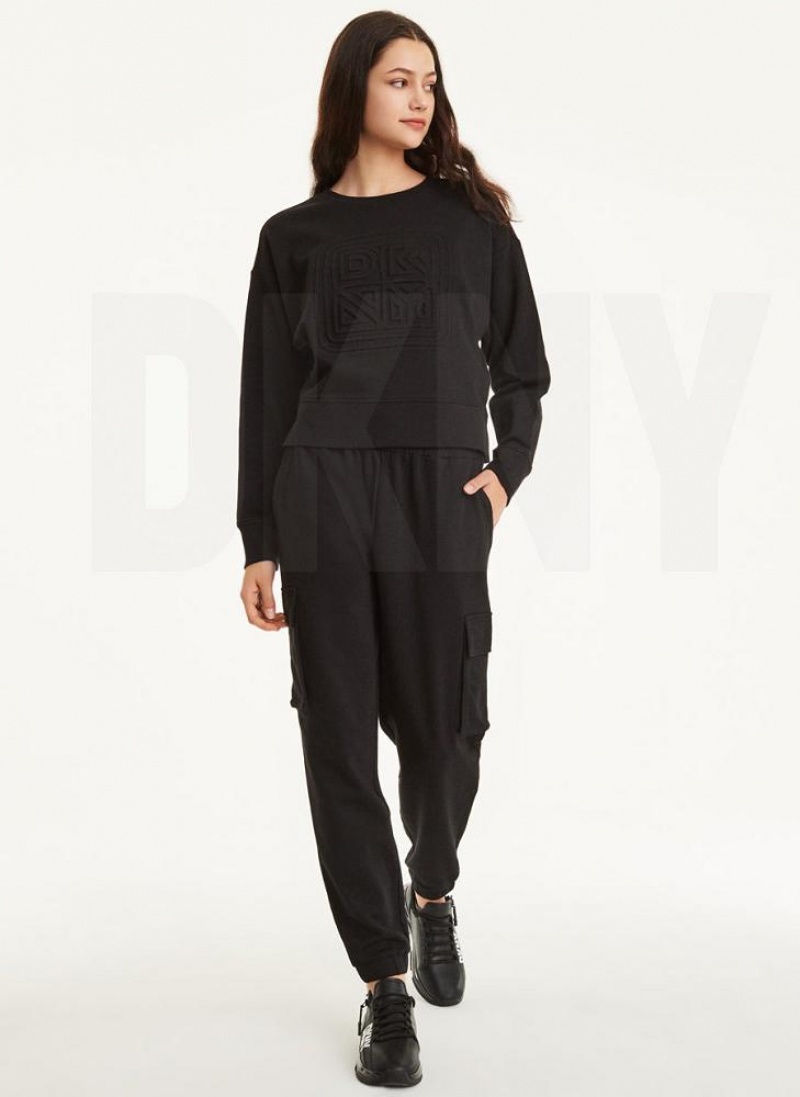 DKNY Embossed Logo Crewneck Women's Sweatshirts Black | Ireland_D1568