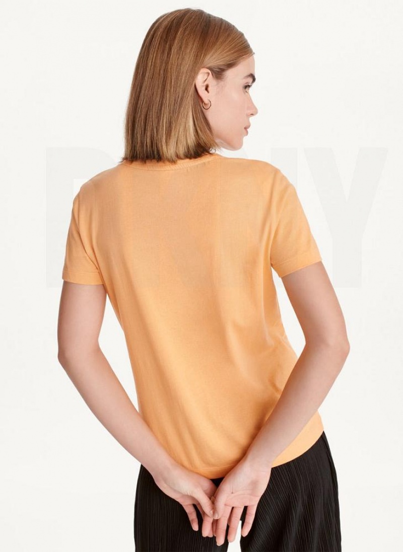 DKNY Short Sleeve Embossed Logo Women's T Shirts Yellow | Ireland_D1248