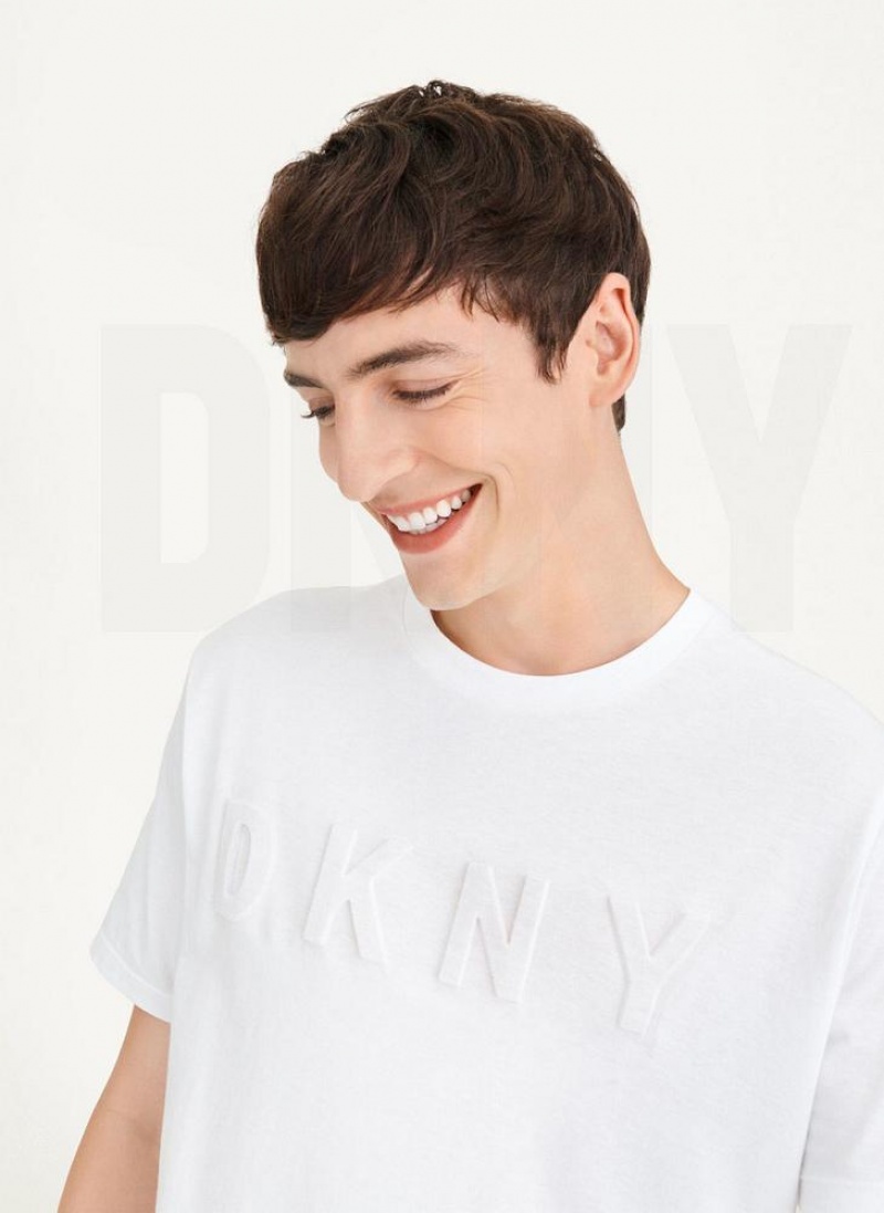 DKNY Stamped Logo Men\'s T Shirts White | Ireland_D1876